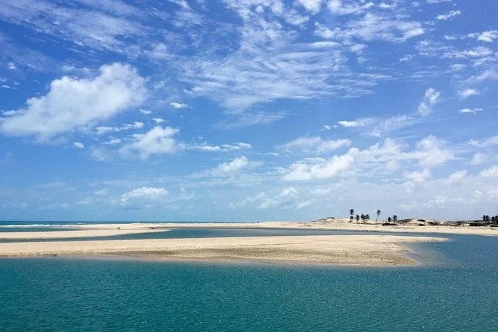 Sandbank and blue-water river mouth — Águas Belas