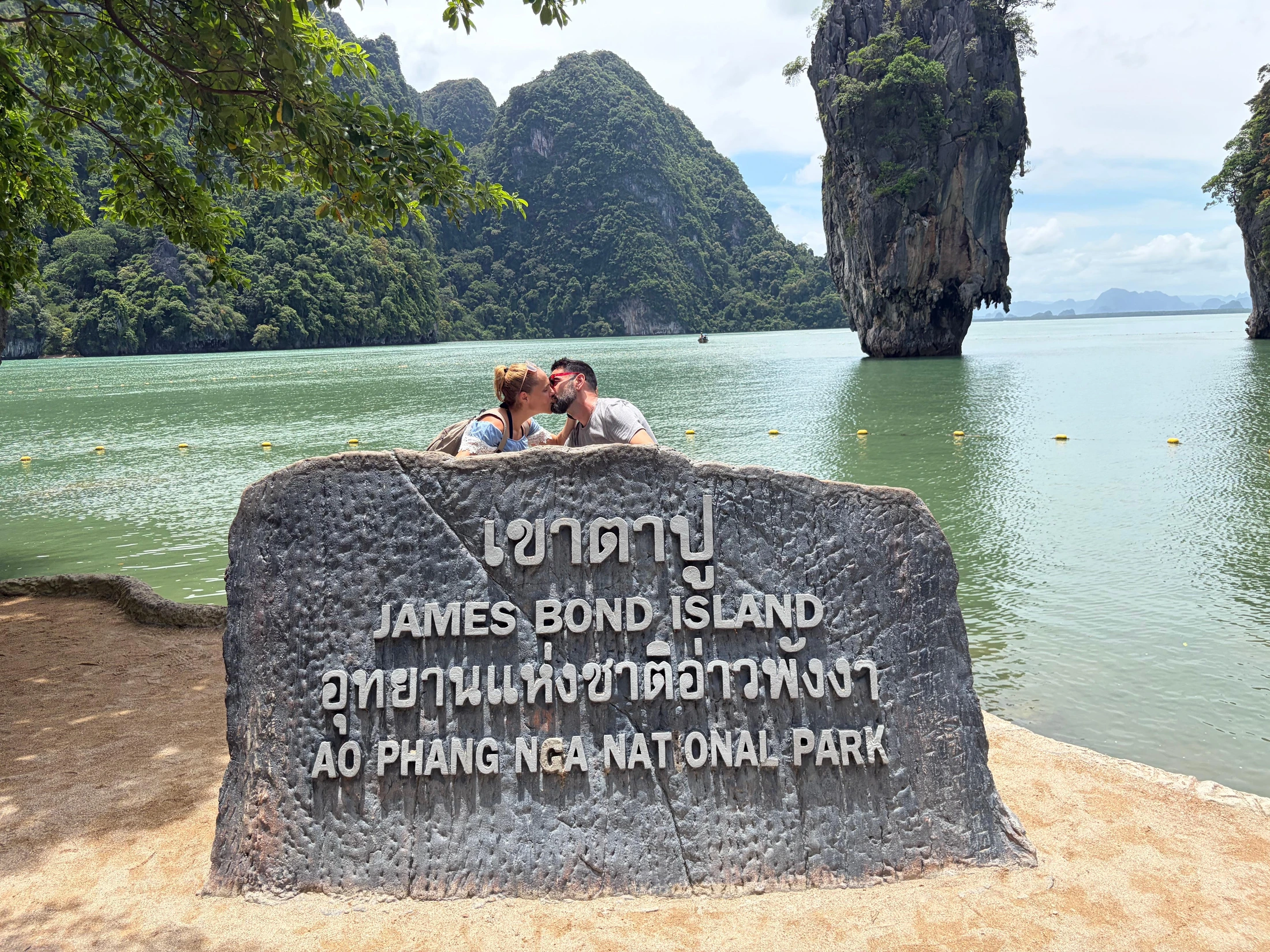 James Bond Island sign in front of Ko Tapu rock in Phang Nga Bay.