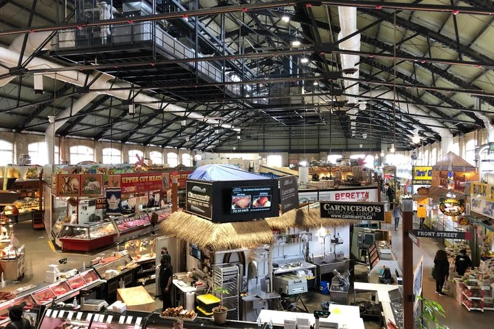 Food stalls beneath the covered structure of St. Lawrence Market