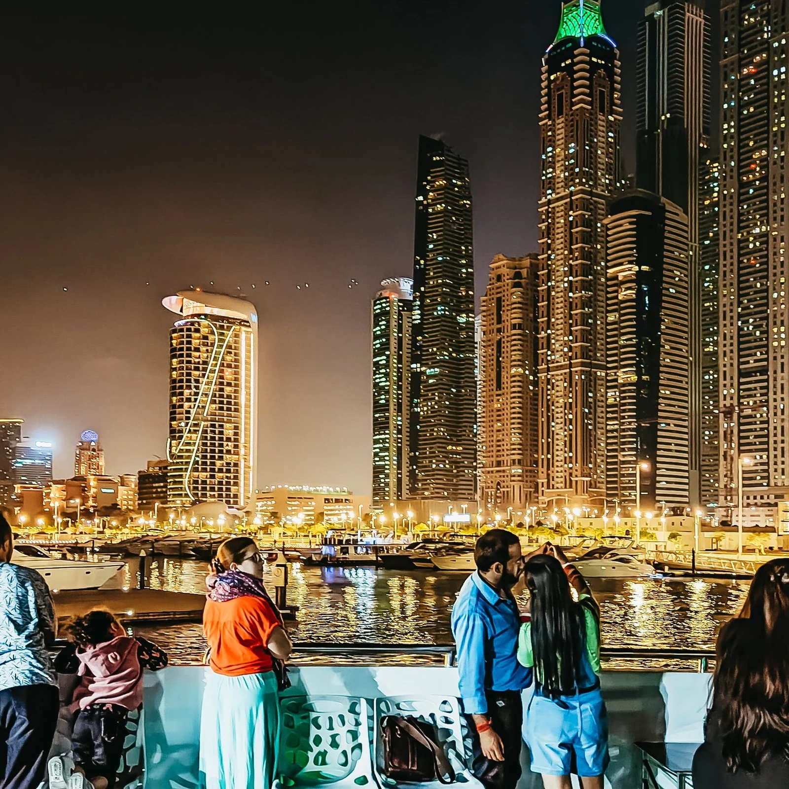 Dubai by night on a mega yacht with buffet dinner and live shows