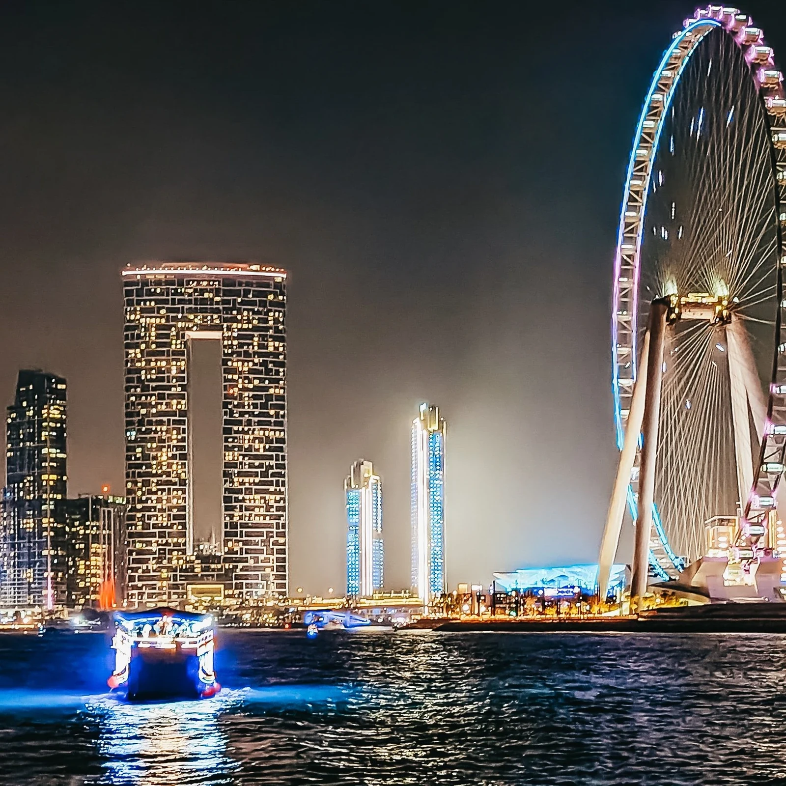 Dubai by night on a mega yacht with buffet dinner and live shows
