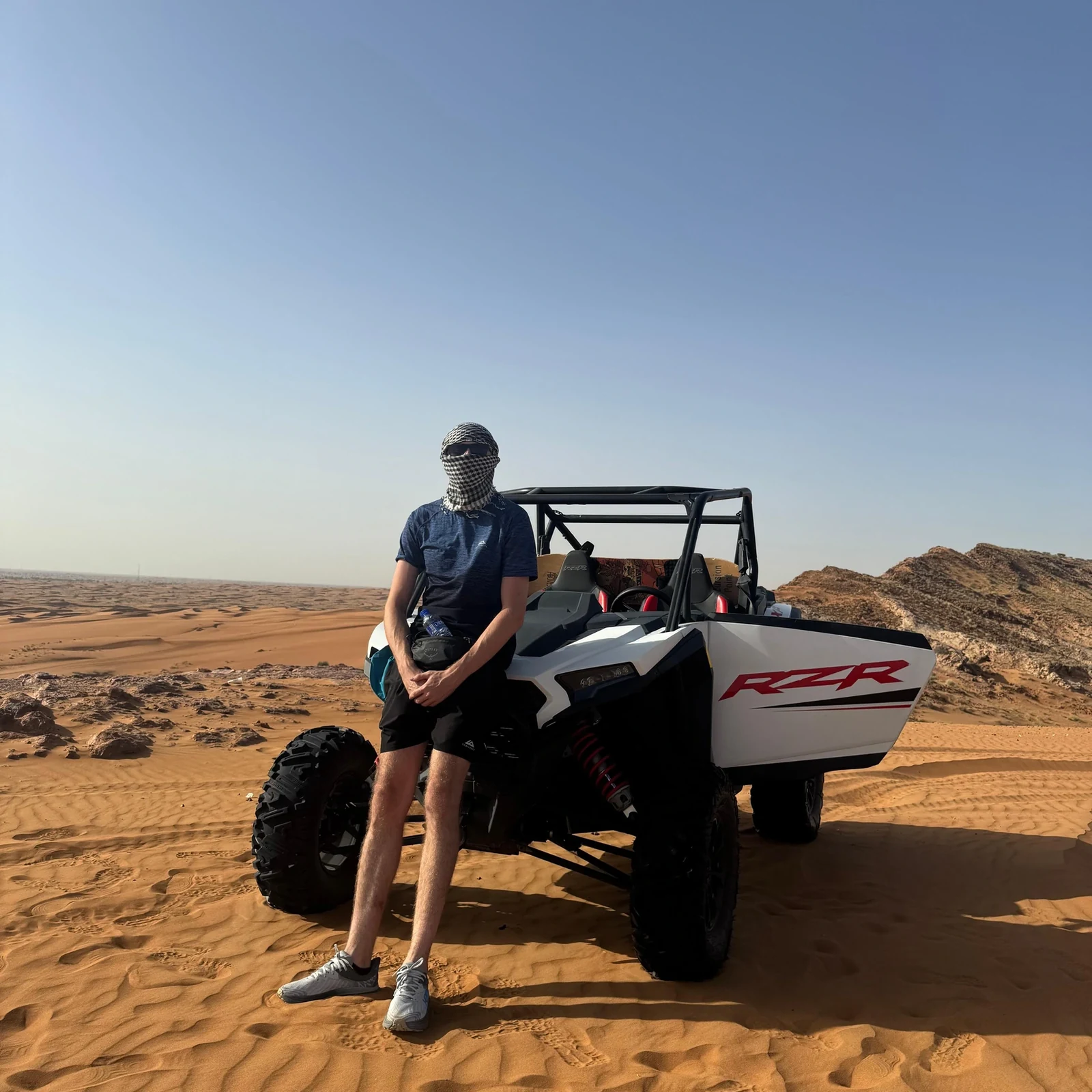 Polaris RZR dune buggy in Dubai with sandboarding and camel ride