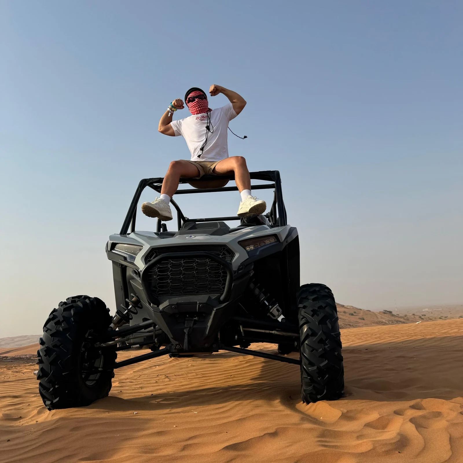 Polaris RZR dune buggy in Dubai with sandboarding and camel ride