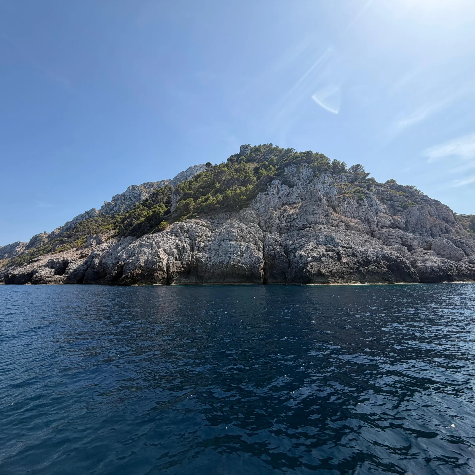 Alcudia: sea caves, snorkeling and paddleboarding by boat