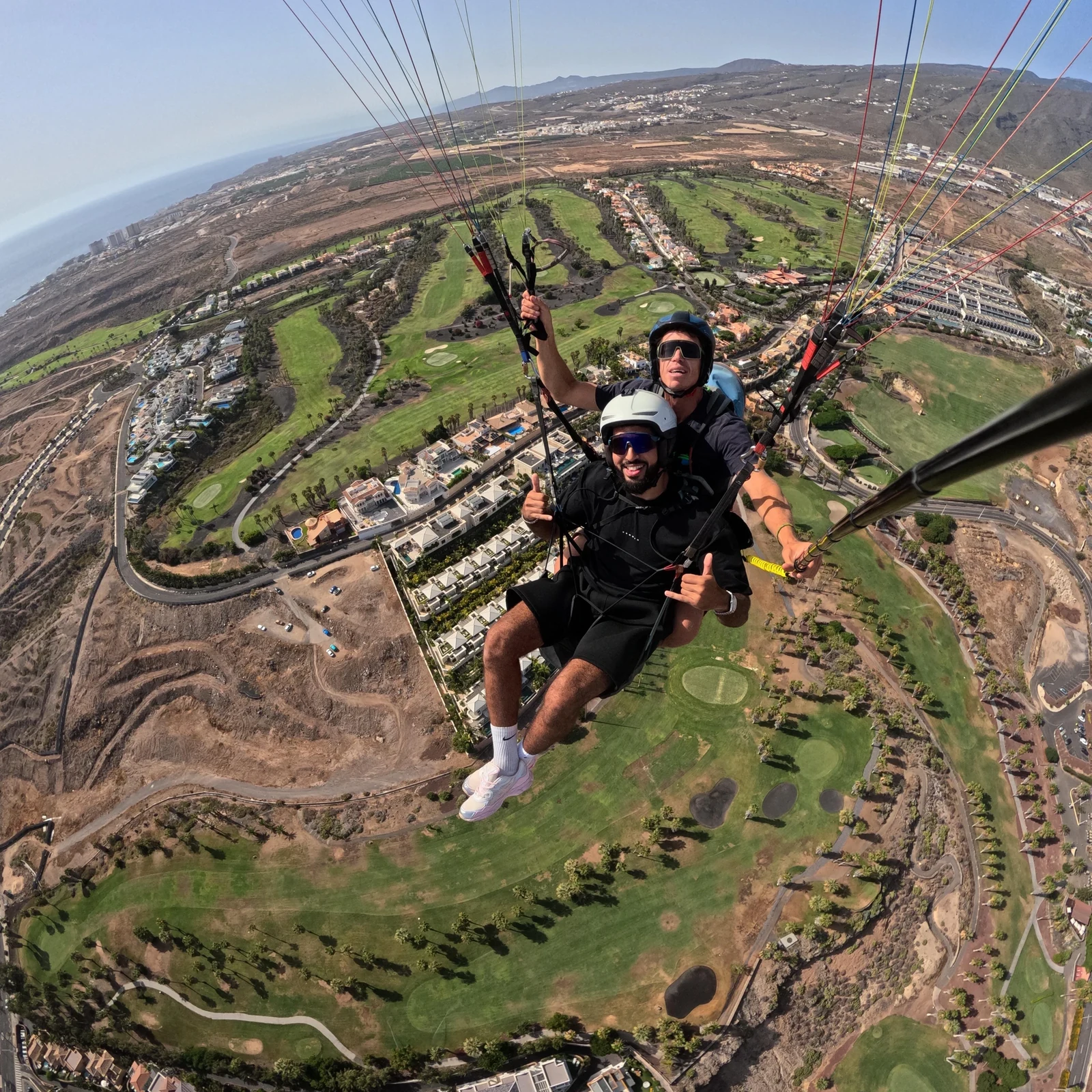 Fly above the mountains and coast of southern Tenerife