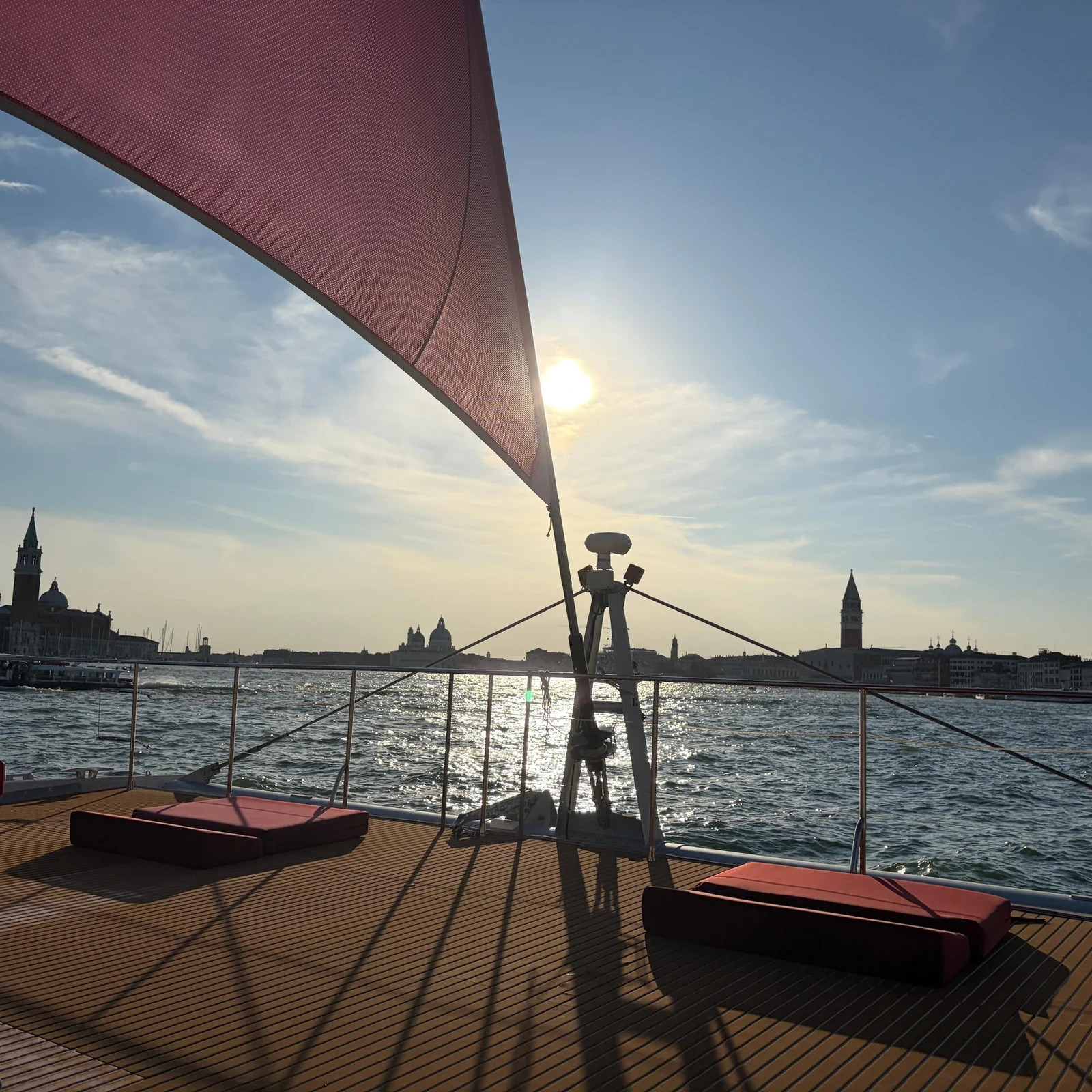 See Venice at sunset from a catamaran