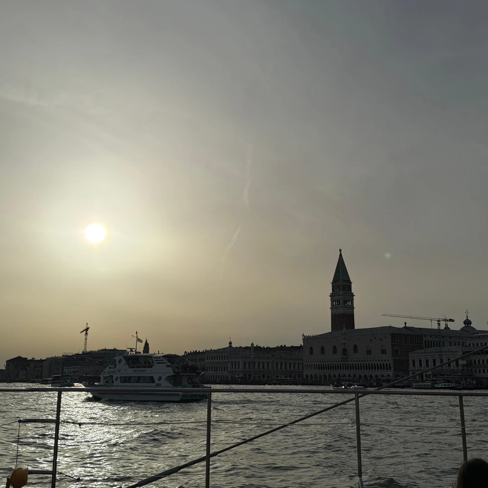 See Venice at sunset from a catamaran