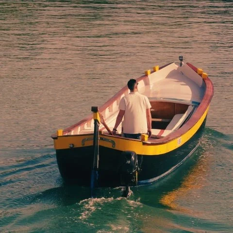 Venedig im Bragozzo bei Sonnenuntergang