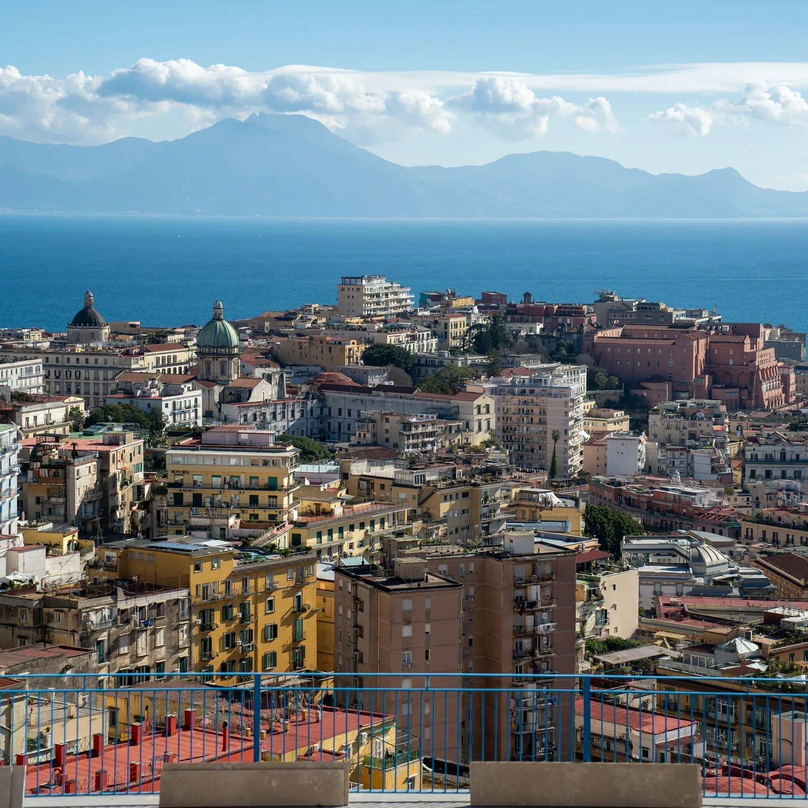 Ride up to Vomero and discover Naples on foot downhill