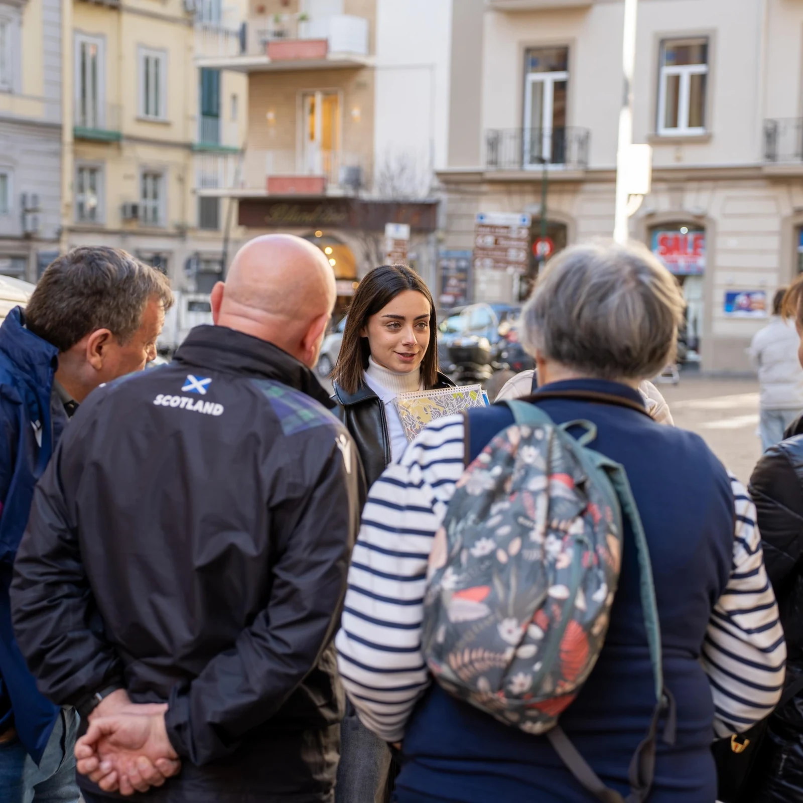 Ride up to Vomero and discover Naples on foot downhill