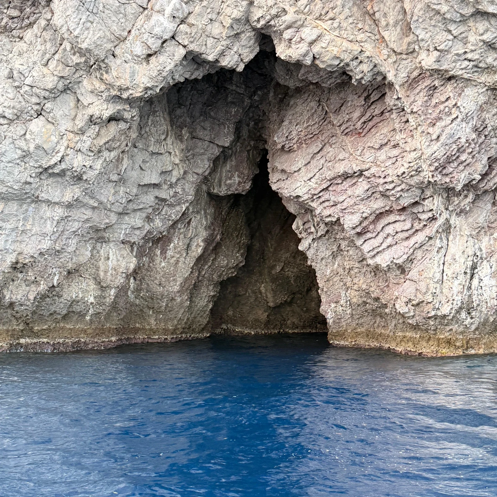 See Taormina from the sea and look for dolphins at sunset