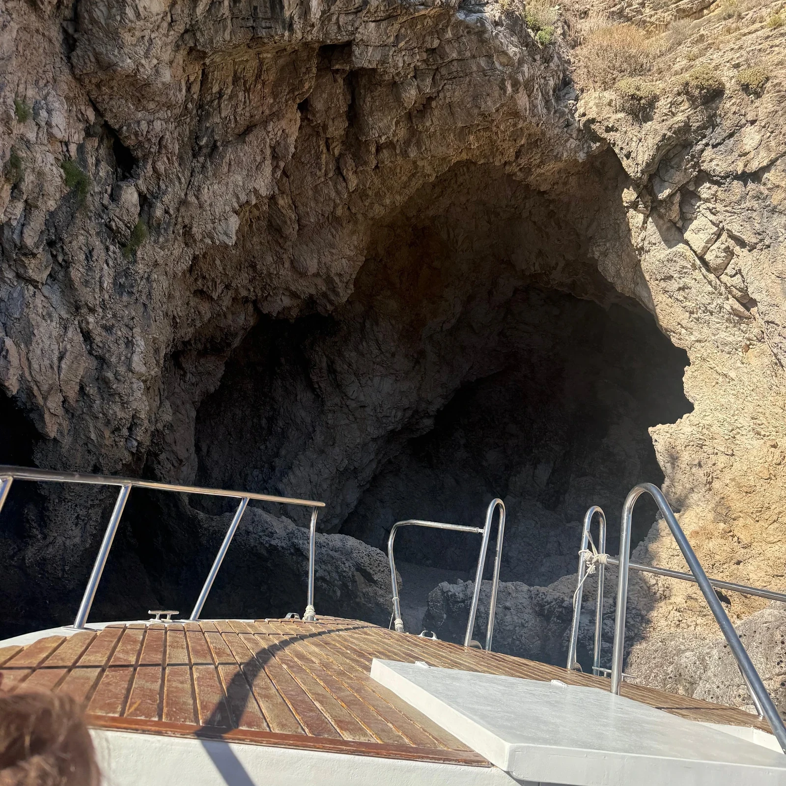 See Taormina from the sea and look for dolphins at sunset