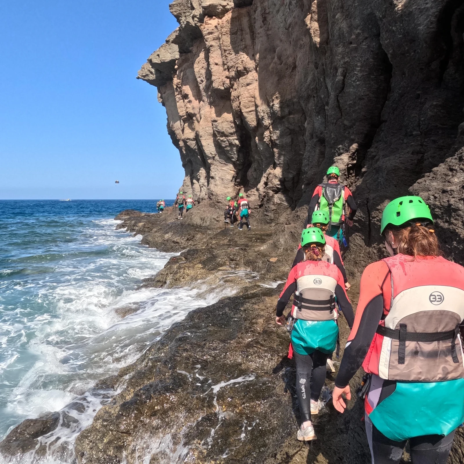 Follow a watercourse on foot, by swimming and by abseiling